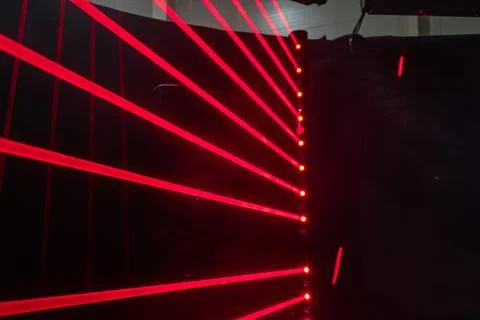 Close-up view of a vertical array of red lights in an industrial setting, emi Fotos de archivo