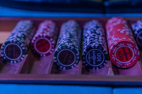 Close-up view of a vertical line of playing cards against dark background, hi 스톡 사진