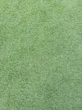 Close-Up View of Vibrant Artificial Grass Surface Stock Photos
