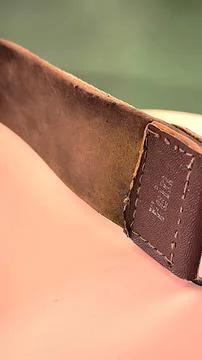 Close up view of vintage leather sharpening strop with stitching Stock Photos
