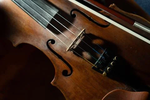 Close view of a violin strings and bridge Stock Photos