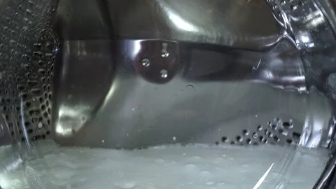 Close up view. The washing machine on a black, dark background. Spinning drum Video stock 121529966