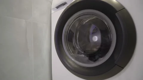 Close-up view of washing process with clothes Stock Footage 153266011