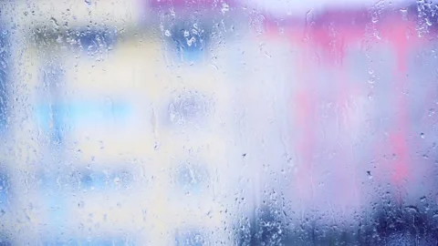 Close up view of water drops falling on glass. Stock Footage 160374028