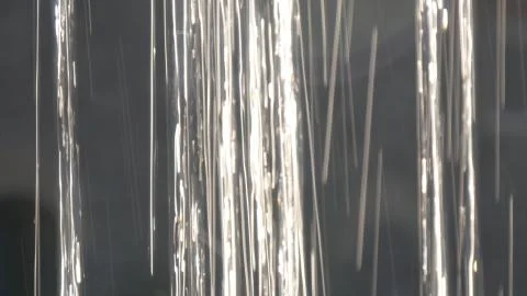 Close up view of water falling down in day light. Stock Photos
