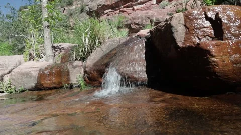 Close Up View Of Water flowing Over Rocks In Oak Creek Canyon Near Sedona, AZ. Stock Footage 275561504
