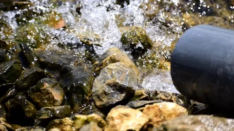 Close-up view of water flowing from pipe 库存影片 114558035