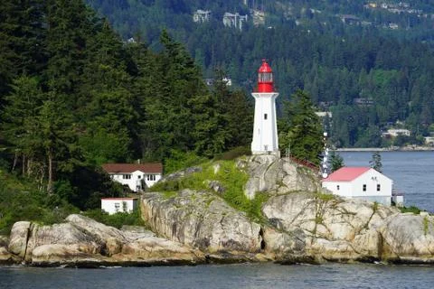 Close view from the water of Point Atkinson Lighthouse, Canada with Sandy Cov Stock Photos