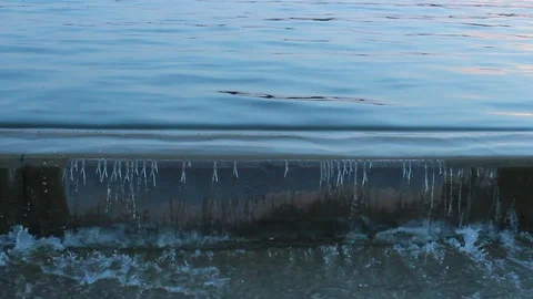 Close View Water Pours Out Of Concrete Dam Stock Footage 106674829