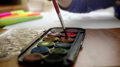 Close up view of watercolor paints. Drawing with paints on paper in kindergarten Video stock 227463513