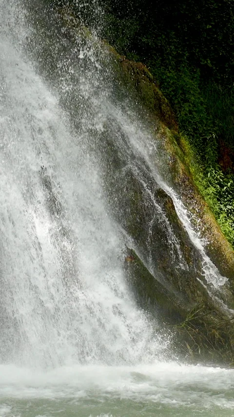 Close Up view waterfall in vertical format. Video stock 294599795