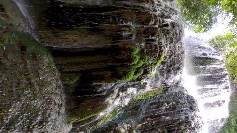 Close Up view waterfall in vertical format. 4k resolution. Video stock 303514196