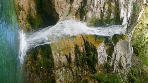 Close-up view of a waterfall in vertical format.4k resolution. Video stock 308403907