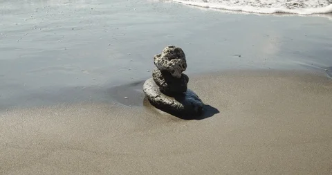 Close view of waves against rock pile. Stock Footage 119960849