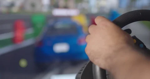 Close up view of a wheel  controller for racing video games Stock Footage 114642140