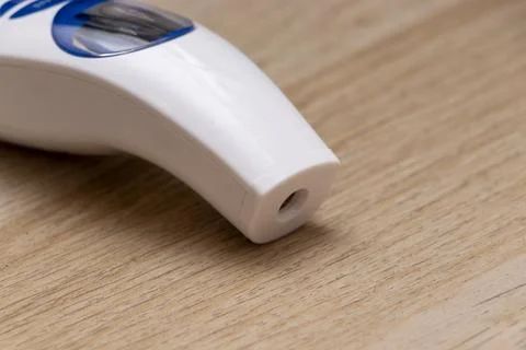 A close-up view of a white device designed for nasal application, featuring a 스톡 사진