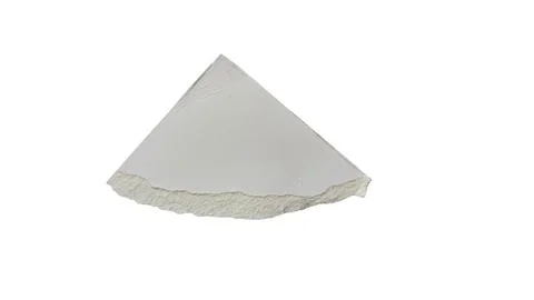 Close-up view of a white pyramid-shaped cake slice イラスト素材
