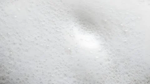 Close up view of white soap foam bubbles with soft light texture and soapy .. Fotos de archivo