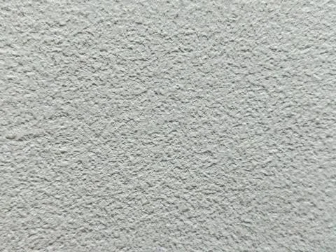 Close up view of white textured wall background. Stock Photos