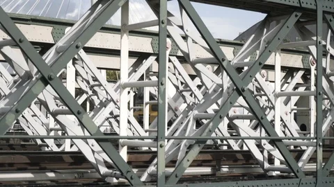 Close-up view of the white wagon going rapidly on the bridge against the blue Stock Footage 123184938