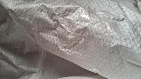 Close up view of white woven plastic polypropylene fabric texture Stock Photos