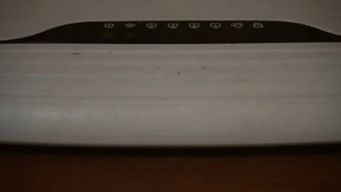 Close-up VIew of Wi-Fi Router Blinking Lights Video stock 77165682