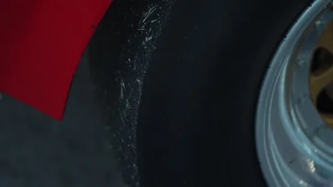 Close up view of a wide racing slick tire on dragster. Stock Footage 342441109