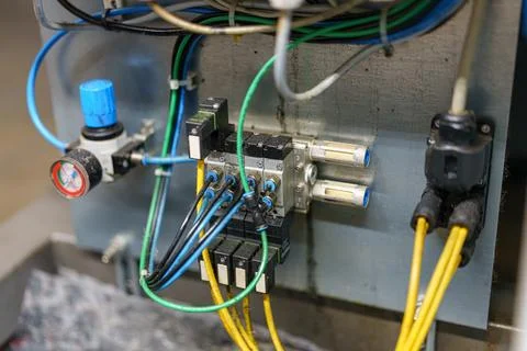Close-up view of wiring and components on a machine in an industrial settin.. Stock Photos