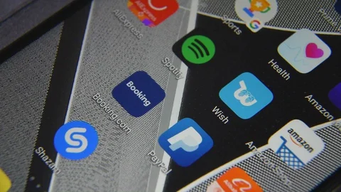 Close-up view of Wish app on an Android smartphone, including other icons. Stock Footage 128269270