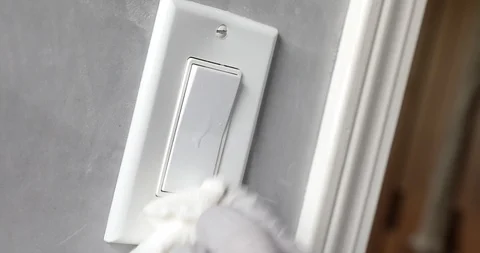 Close up view of woman hand using antibacterial wet wipe for disinfecting home Stock Footage 126947596