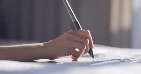 Close up view of woman hand using digital tablet drawing with stylus pen Stock Footage 152142633