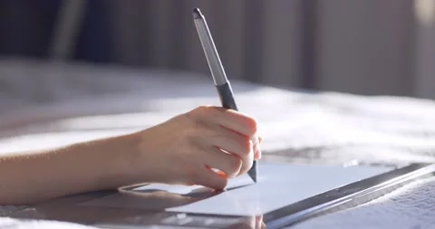 Close up view of woman hand using digital tablet drawing with stylus pen Video stock 153333057