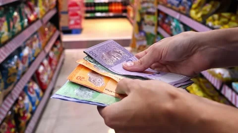 Close up view of woman hands counting cash money for shopping in supermarket. Stock Footage 299839632