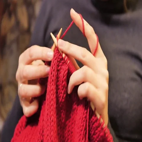 Close-up view of woman hands doing knitting Stock Footage 69490169