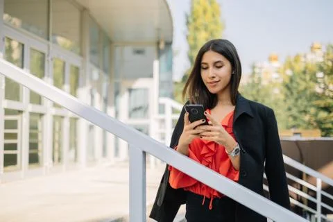 Close-up view of woman texting on her smartphone Stock Photos