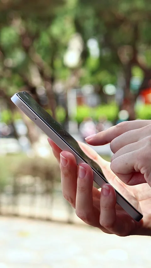 Close up view of woman using smartphone Stock Footage 310631818