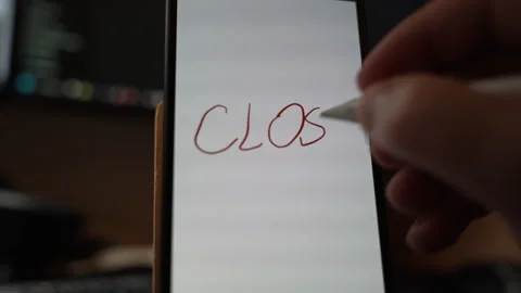 Close view of the word CLOSE handwritten with a stylus on a smartphone screen Stock Footage 324711287