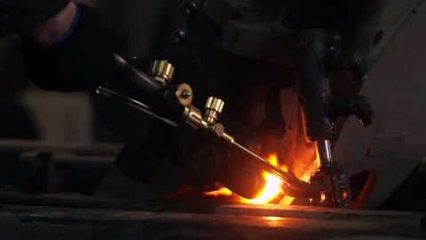 Close view worker burns detail part with gas burner flame 스톡 동영상 101045897