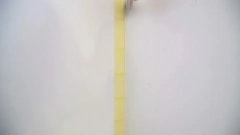 Close-up View of Worker Painter Paints the Corner of Wall with a Brush Stock Footage 125709377