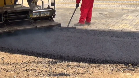 Close view on the workers and the asphalting machines Stock-Footage 113446707
