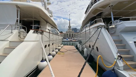 Close-up view on yachts moored at pier in Sochi seaport, time lapse video Stock Footage 94982789