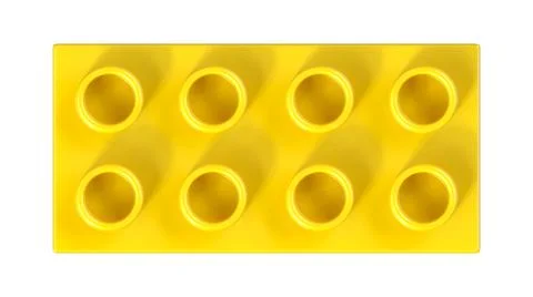 Close Up View of an Yellow Plastic Lego Block Isolated on a White Background. Stock-Illustration