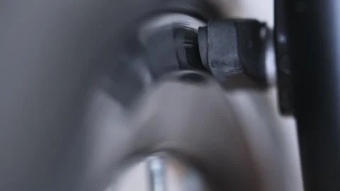 In a close-up view, you can see the braking mechanism of the bicycle, which Stock Footage 249259940
