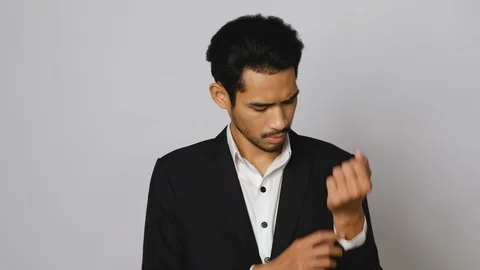 Close-up view of young asian man in formal business suit or groom costume get Stock Footage 124547559