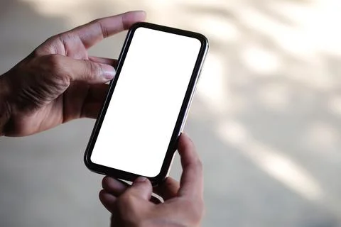 Close up view young man using smart phone. Blank screen for your information. Foto stock