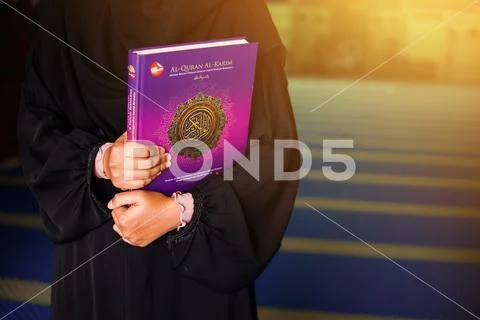 Close up view of young muslim woman wearing black abaya dress Stock Photos