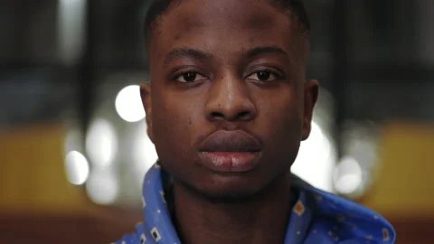 Close up view of young serious afro american man looking to camera. Portrait of Stock Footage 152330354