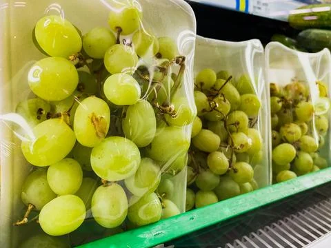 Close-Up Views of Assorted Fresh Green Grapes Presented in a Supermarket Cool Stock Photos