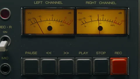 Close-Up of a Vintage Audio Recorder with VU Meters and Control Buttons Stock Footage 300577496