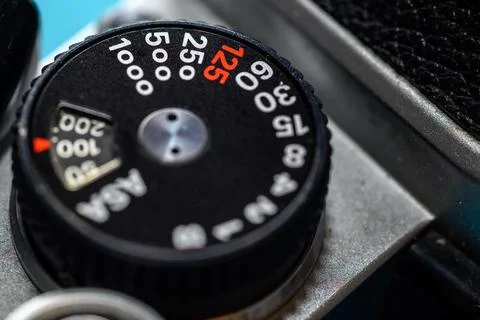 Close-up of a vintage camera shutter speed dial with numbers Stock Photos